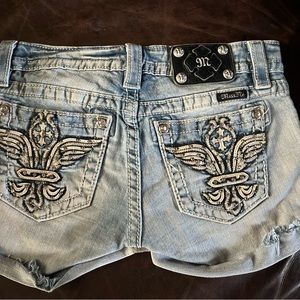 Miss me really cute like new shorts. All bling intact.